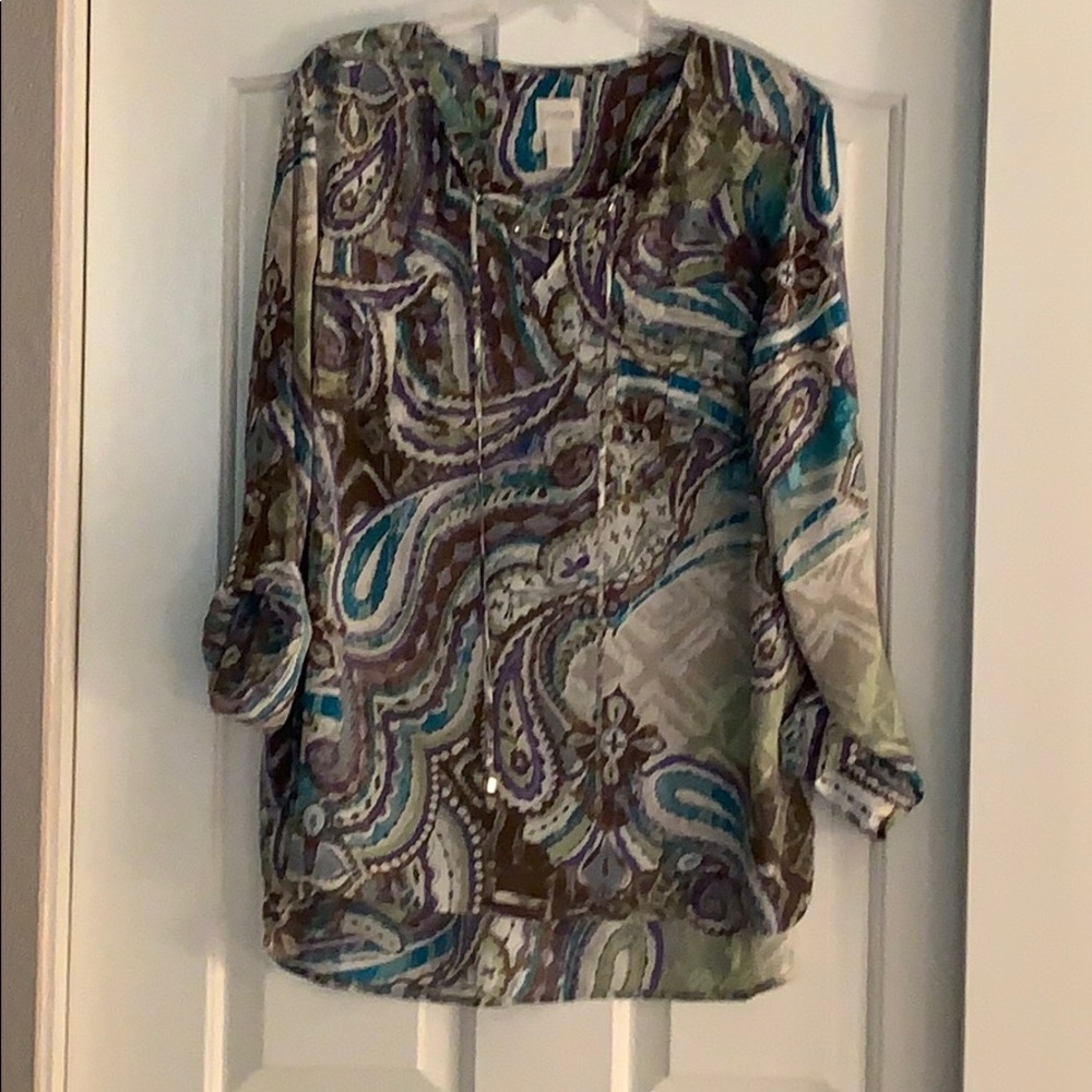 Chico’s blouse. Multi colored. Longer back. Size 2